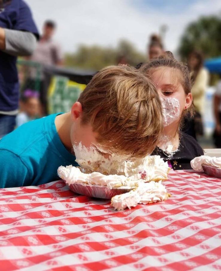 Fun for all ages! Pie Easting Contest at the Pickin' & Grinnin' Strawberry Jam Festival near Murfreesboro, TN