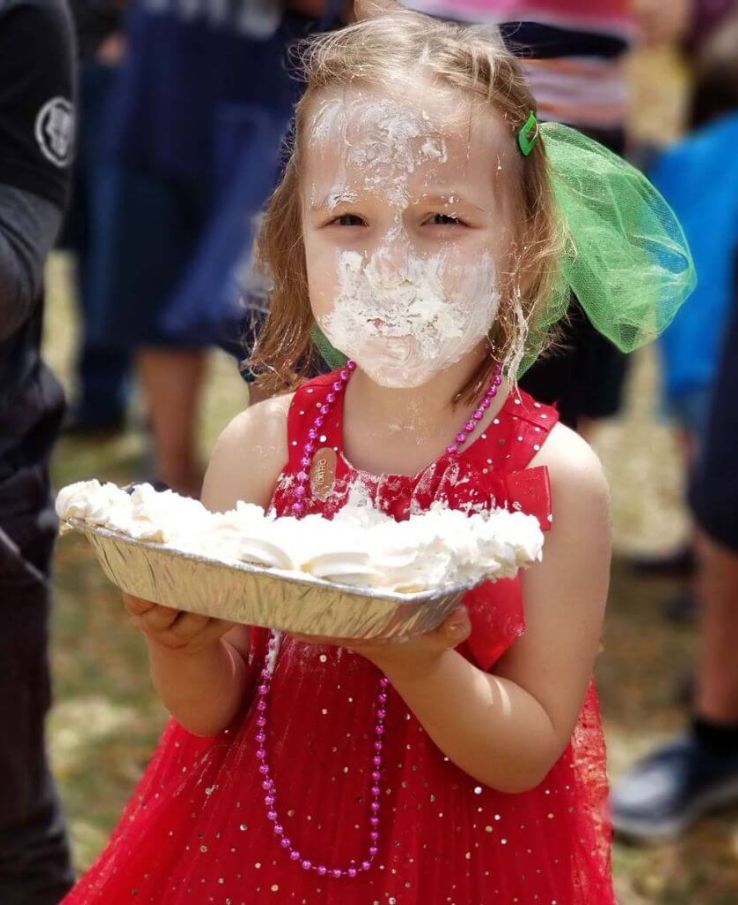 Messy but Fun! Compete in the Pie Eating Contest at the Strawberry Jam Festival near Franklin, TN